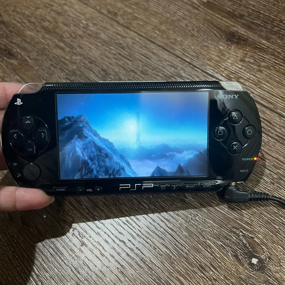 Sony PSP 1001 Portable Gaming System - Black with 5 games
